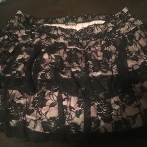 Deb mini skirt. Light pink with black lace top.